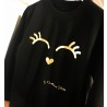 Sudadera negra pestañas de karolina toledo